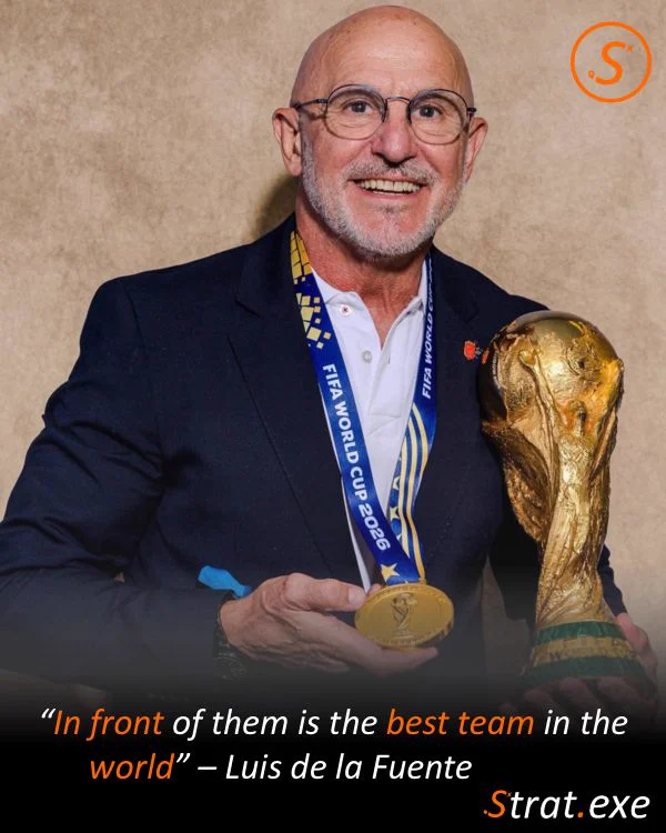 Luis de la Fuente holding the World Cup trophy, with the quote “In front of them is the best team in the world”